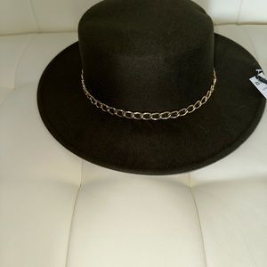 Black and gold hat
